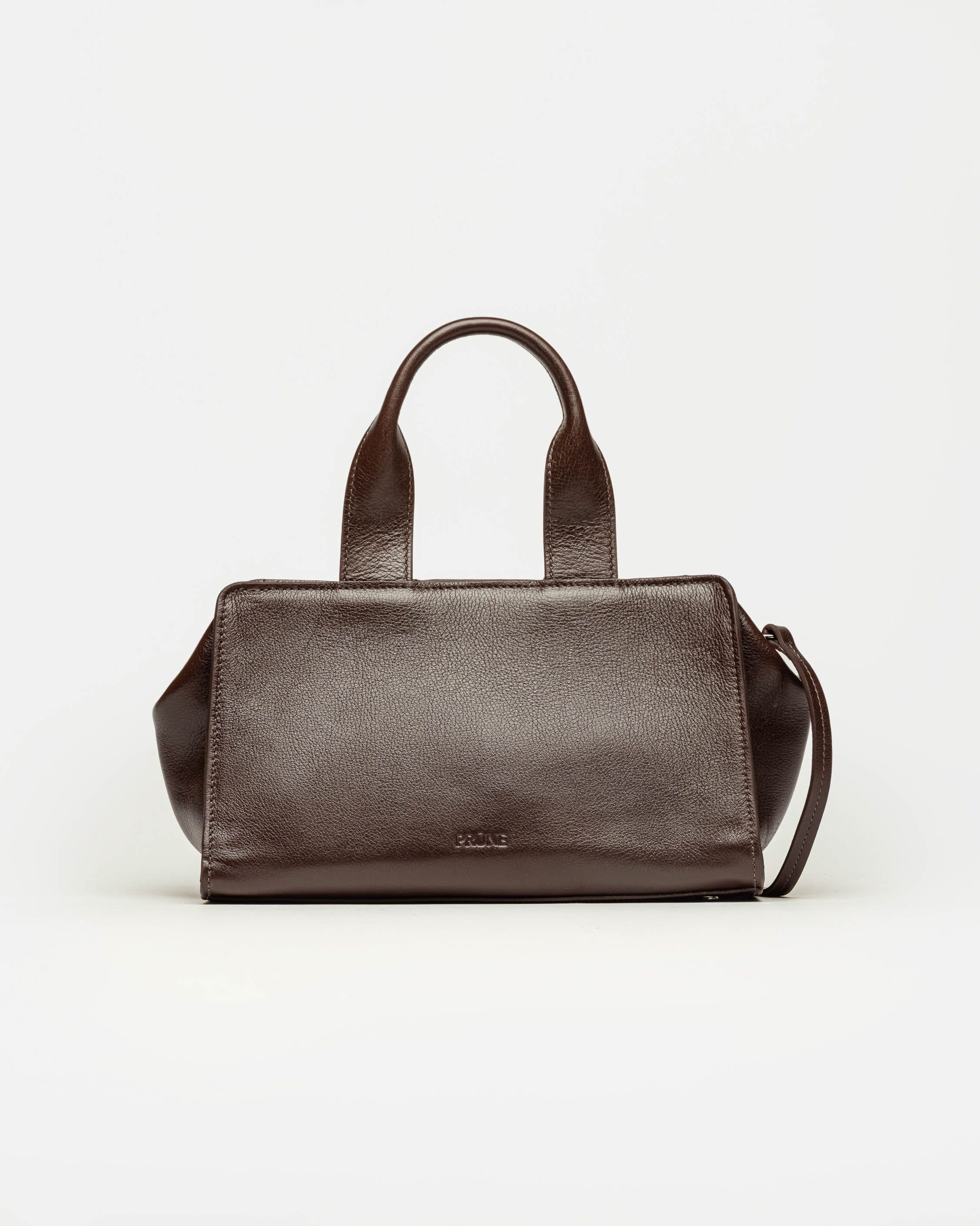 Cartera de mano Mila en cuero liso