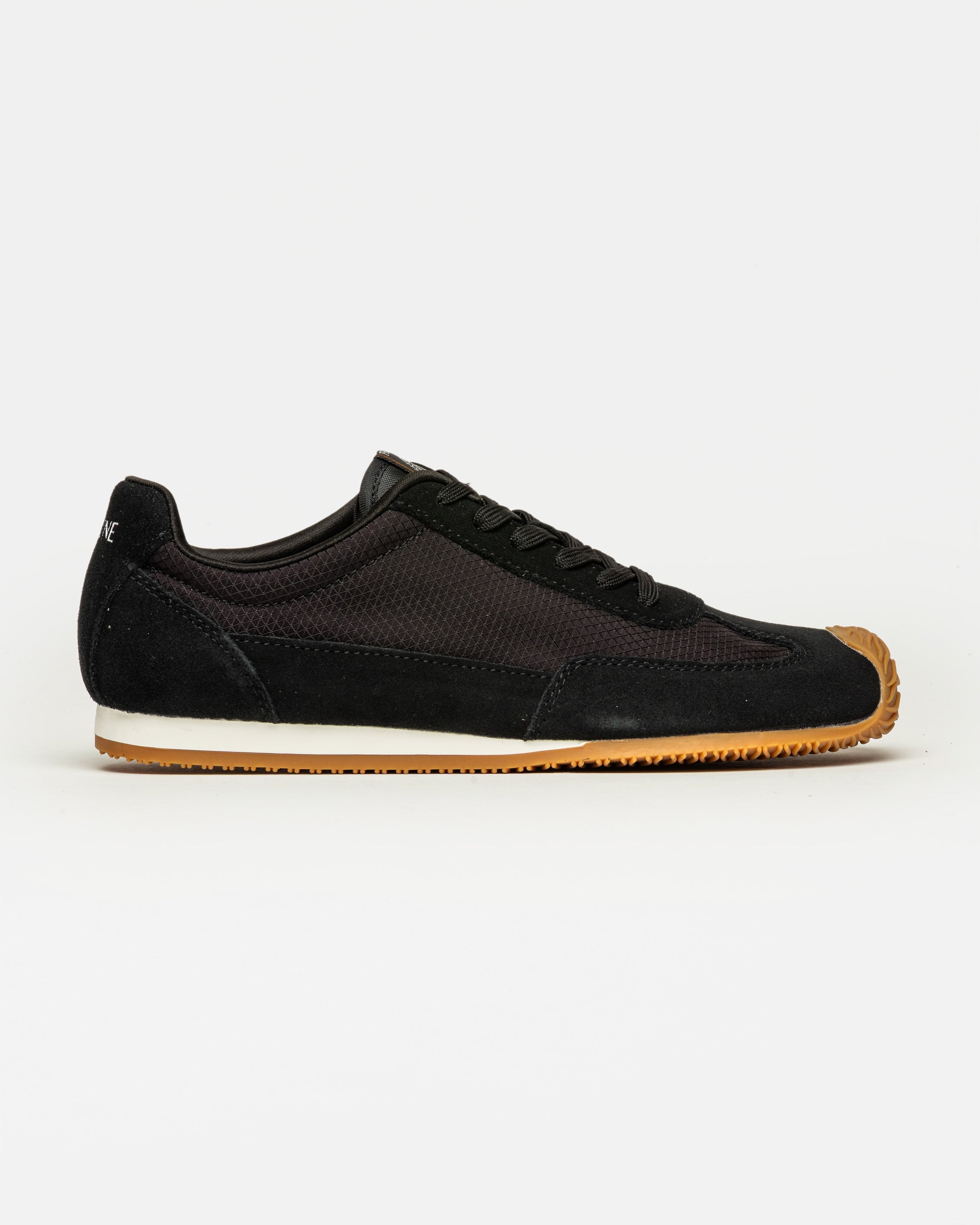 Sneaker Row en cuero y textil