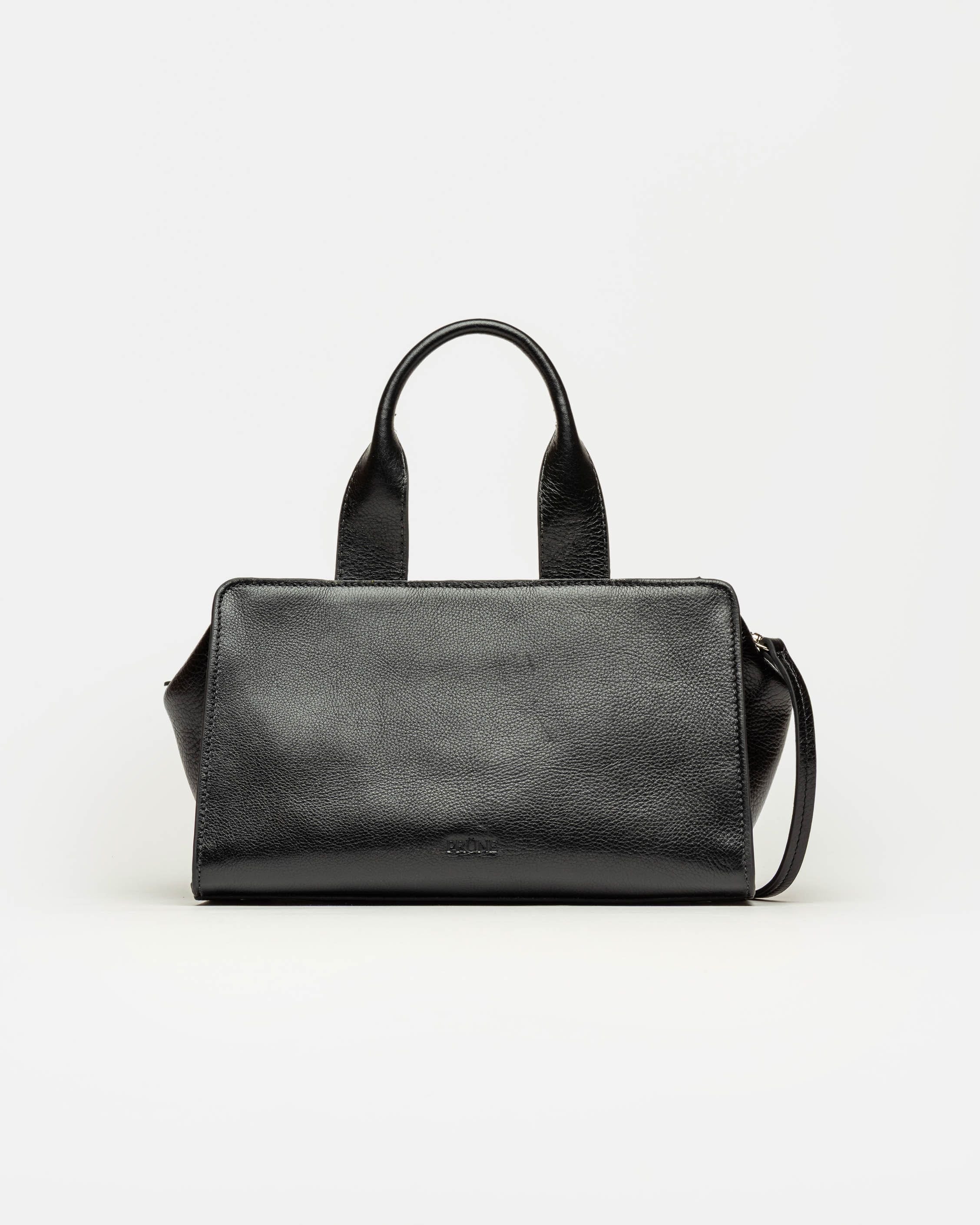Cartera de mano Mila en cuero liso